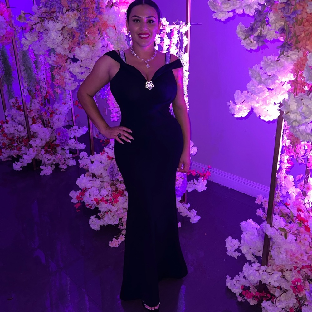 Black long rhinestone dress. In great conditions added a flower pendant.